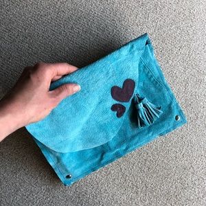 Blue suede leather clutch with hearts